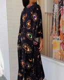 The Stars & Attentive Eyes Printed V-Neck Maxi Dress